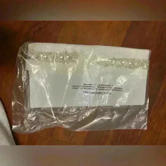 DAVIDS BRIDAL- Pearl and Crystal Bead Embellished Sash
STYLE# 51093 - Picture 9 of 9